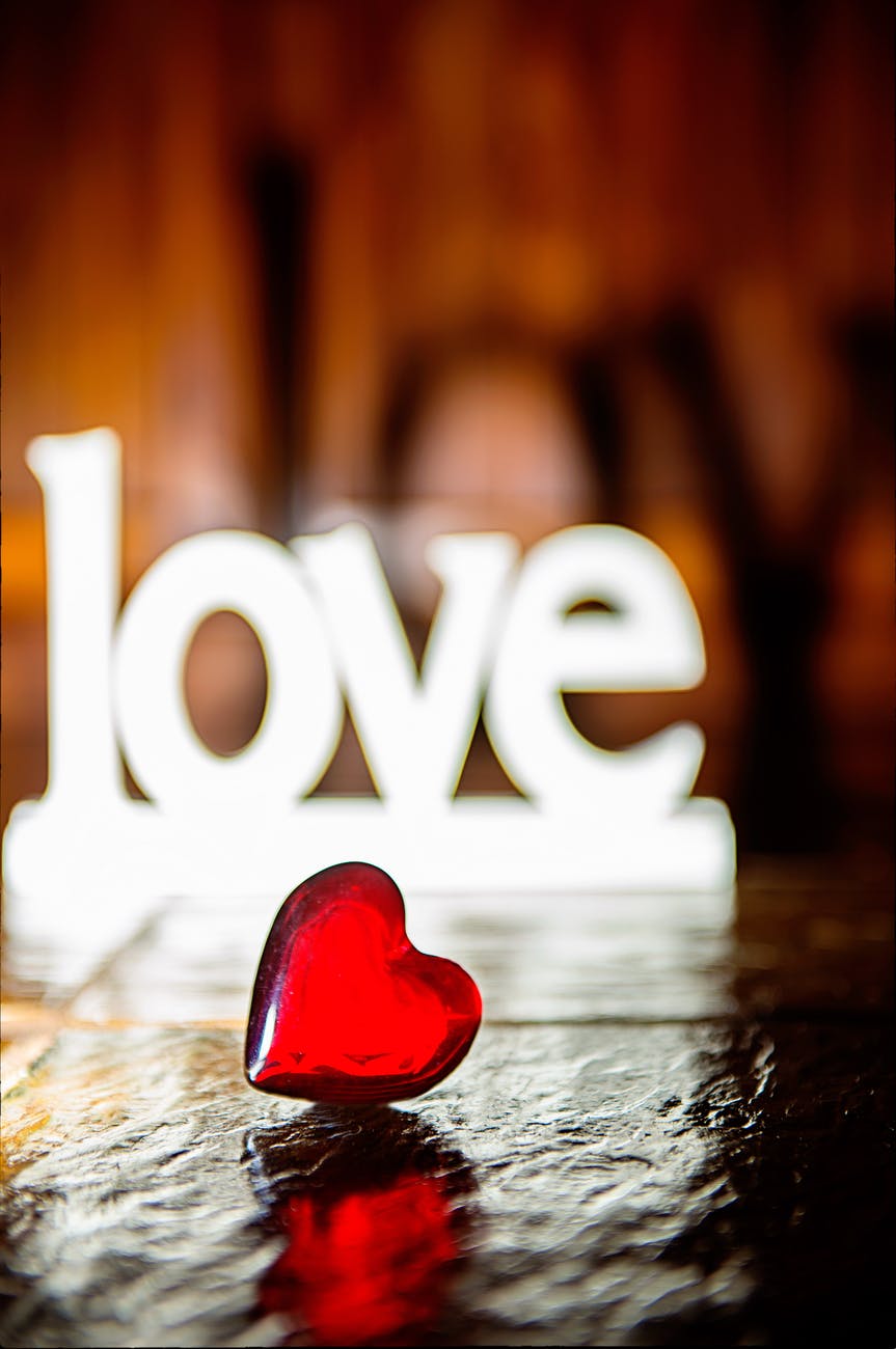 closeup photo of red heart shaped figure